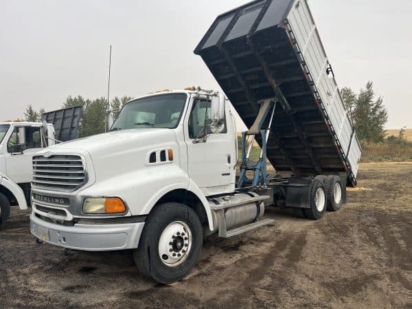 2004 Sterling tandem axle 20’ bed