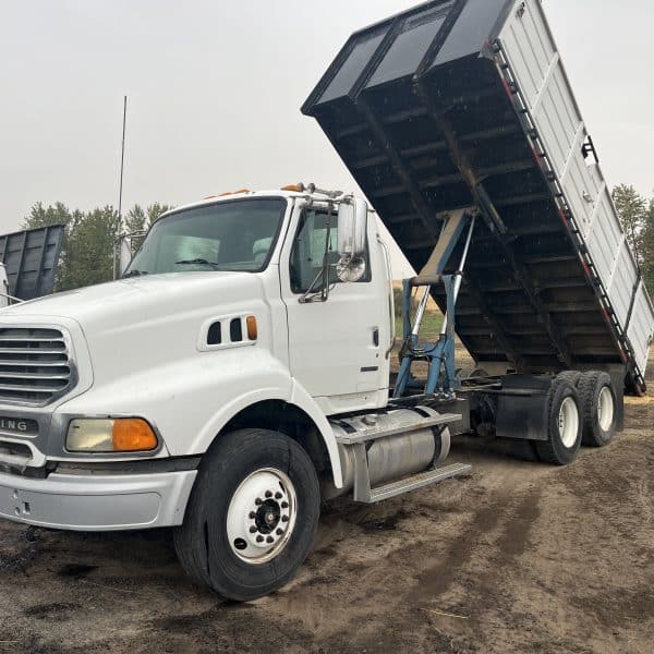 2004 Sterling tandem axle 20’ bed